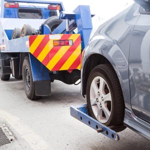 tow-truck-towing-a-broken-down-car-on-the-street-PE9HH3A.jpg tow-truck-towing-a-broken-down-car-on-the-street-PE9HH3A.jpg